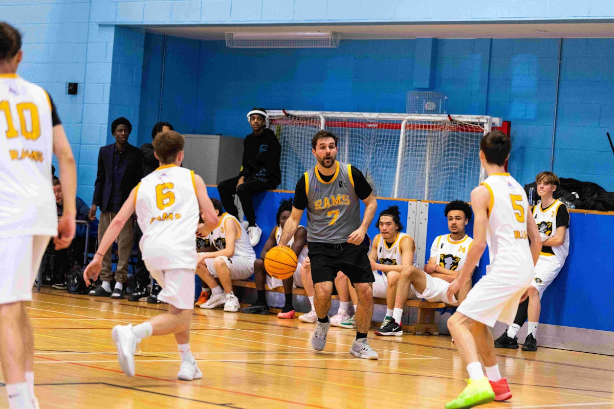 Suffolk New College staff member Mike Mears in the staff v student anti knife crime basketball match